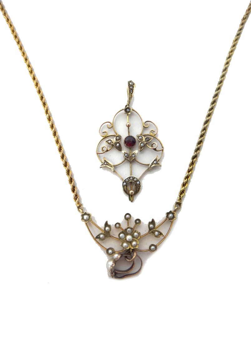 Appraisal: A gold and seed pearl set ropetwist link pendant necklace