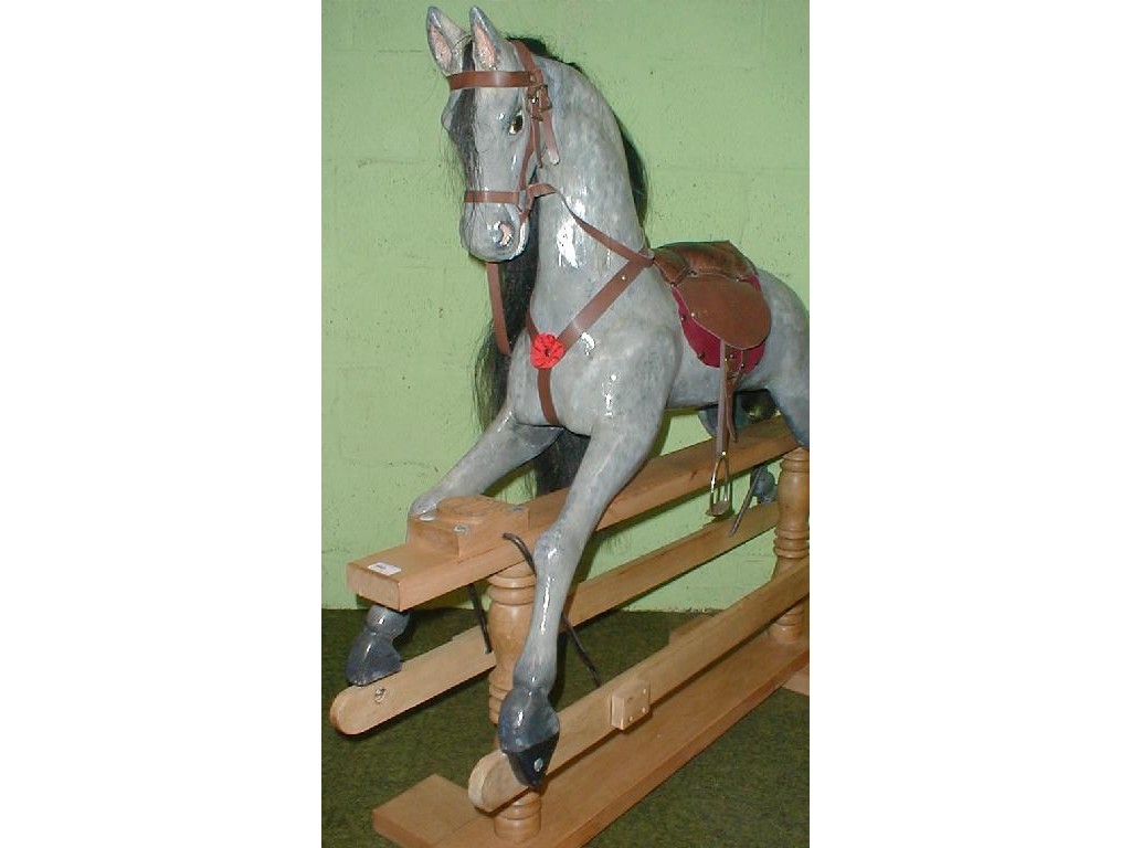 Appraisal: A traditional hand crafted rocking horse by The Rocking Horse