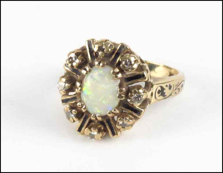 Appraisal: OPAL DIAMOND AND KARAT YELLOW GOLD RING grams Condition No