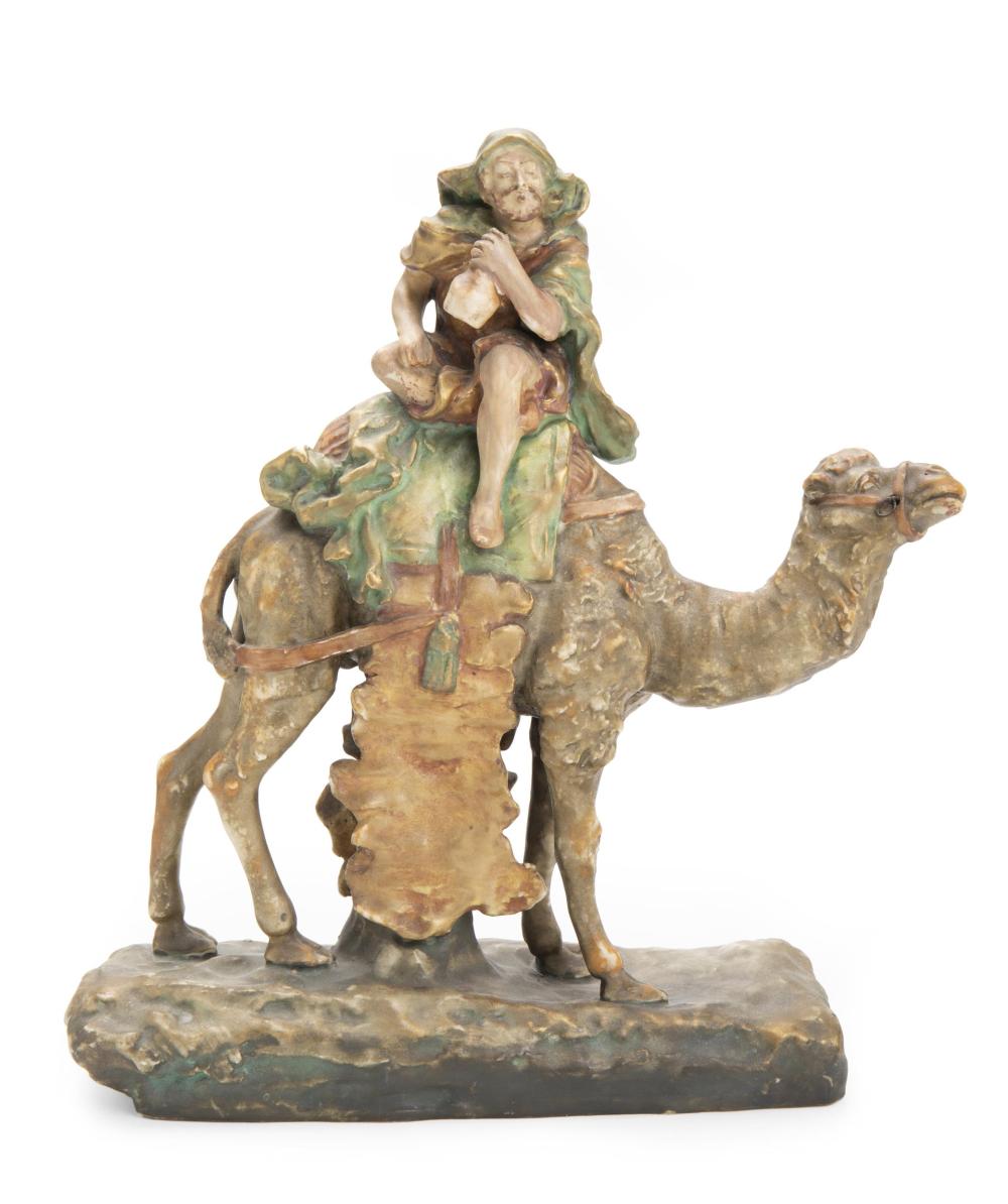 Appraisal: An Amphora figure of a man on a camel Circa