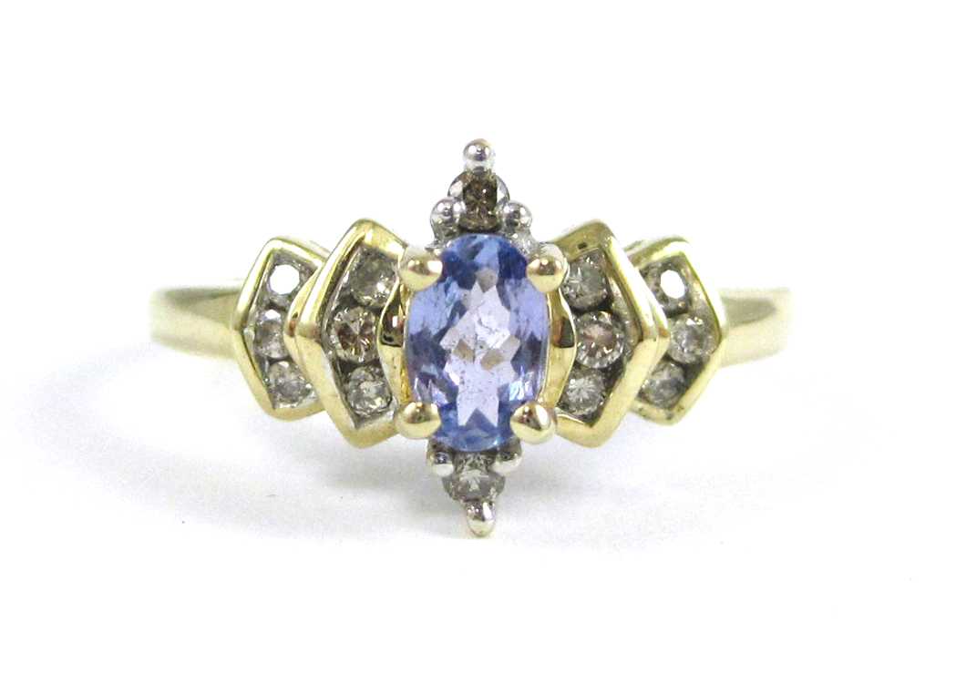 Appraisal: TANZANITE DIAMOND AND TEN KARAT GOLD RING with round-cut diamonds