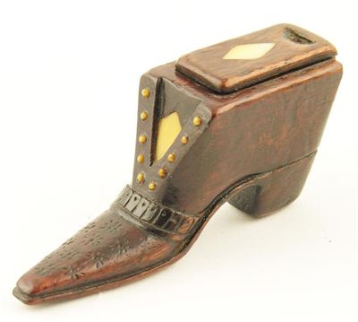 Appraisal: A Victorian treen and bone snuff shoe with sliding cover