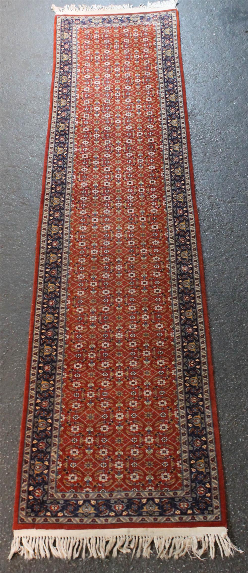 Appraisal: PERSIAN HAMADAN INJELAS WOOL RUNNER allover design on red field