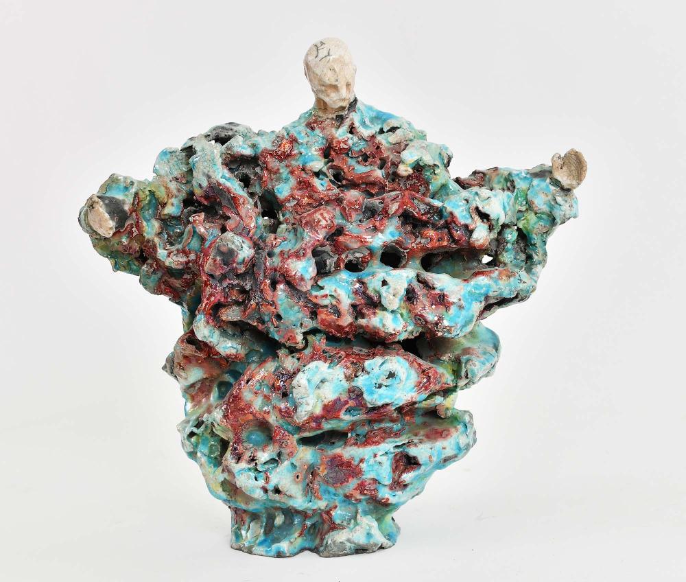 Appraisal: CONTEMPORARY PAINTED CERAMIC ABSTRACT FIGUREThe asymmetrical figure with a realistic