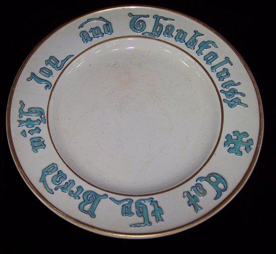 Appraisal: A pedestal dish of white ground the border with text