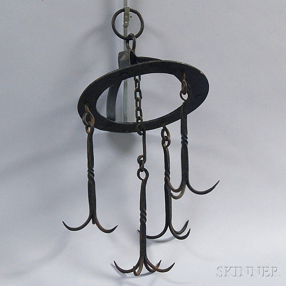 Appraisal: Wrought Iron Drying Rack th century the outer ring supporting