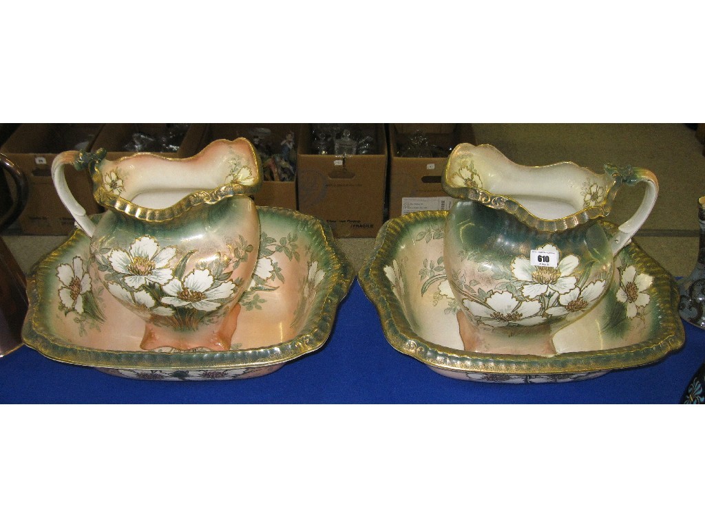 Appraisal: Pair of ewer and basins each with floral decorations