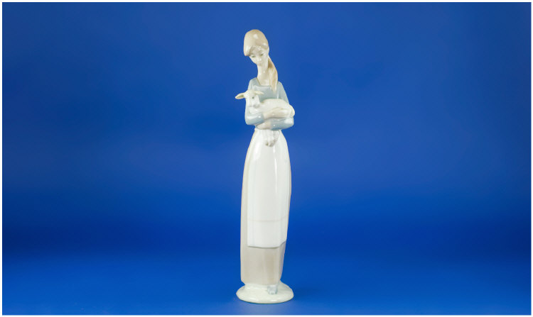 Appraisal: Lladro Figure Girl Holding Lamb inches high