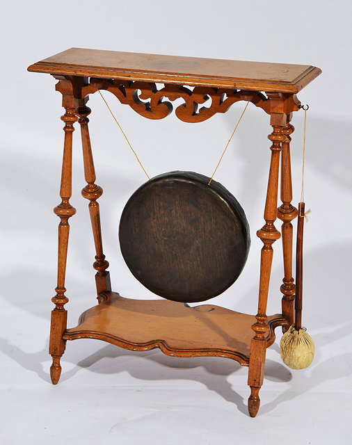 Appraisal: A VICTORIAN LIGHT OAK DINNER GONG AND STAND with a