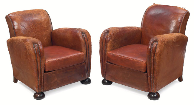 Appraisal: French club chairs pair upholstered leather on ball feet overall