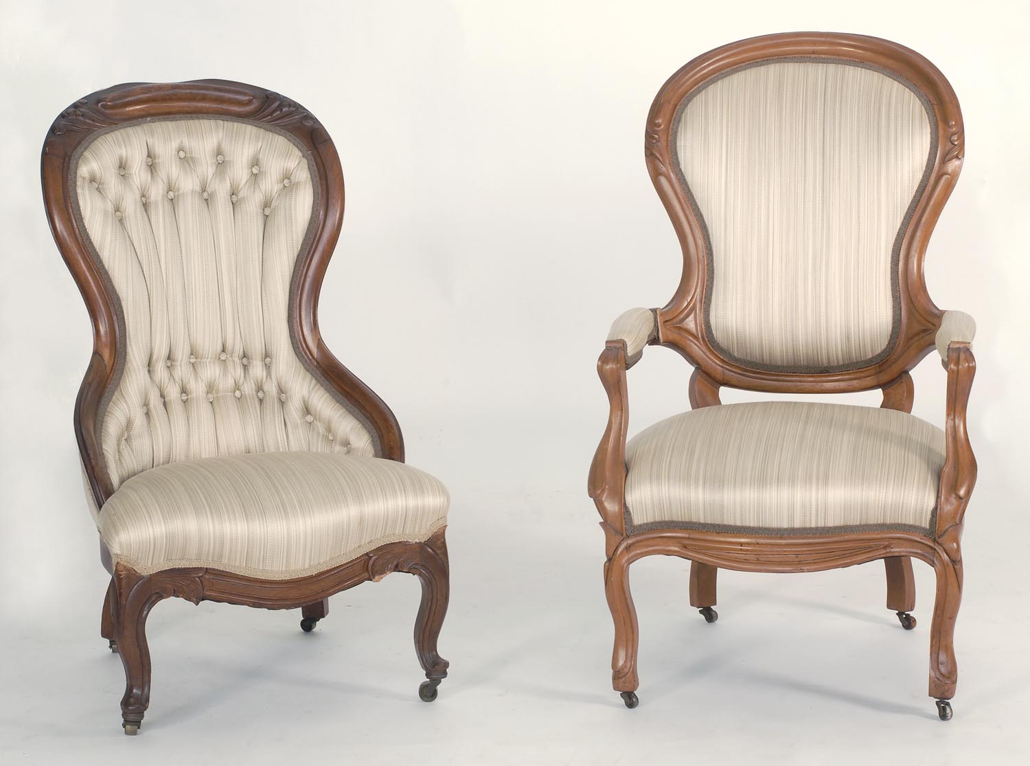 Appraisal: TWO VICTORIAN CHAIRS a gentleman's chair and a lady's chair