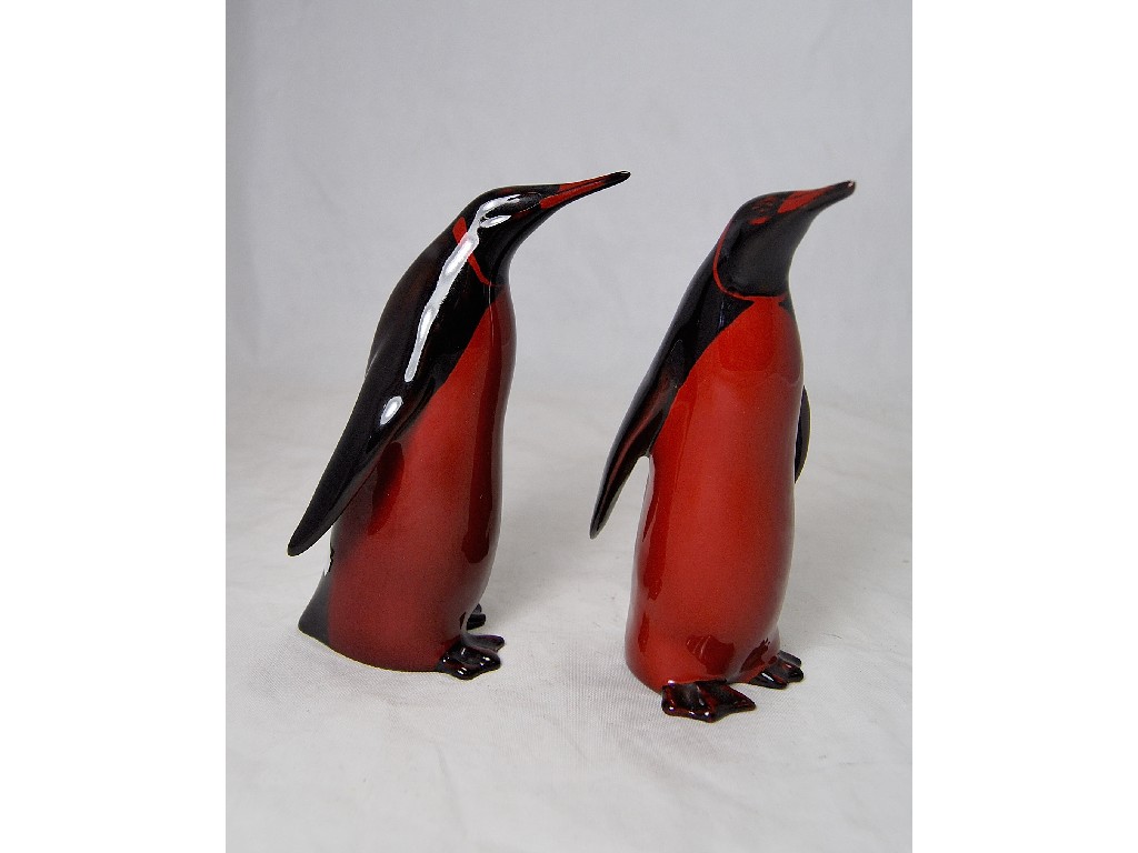 Appraisal: Two Royal Doulton 'Flambe' penguins