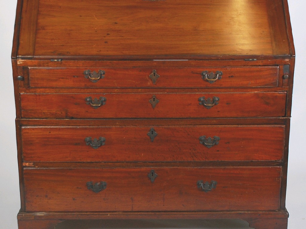 Appraisal: LATE GEORGIAN MAHOGANY BUREAU the rectangular top above a fall