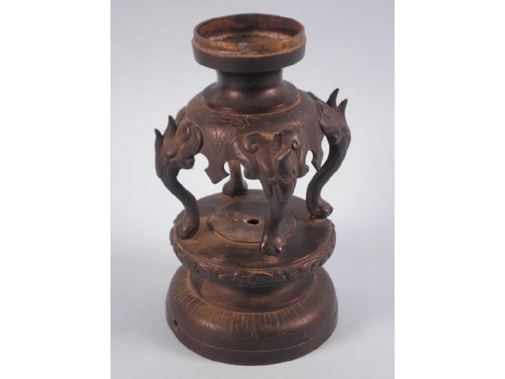 Appraisal: A Chinese bronze lamp base on four legsProvenance Barbara Lady