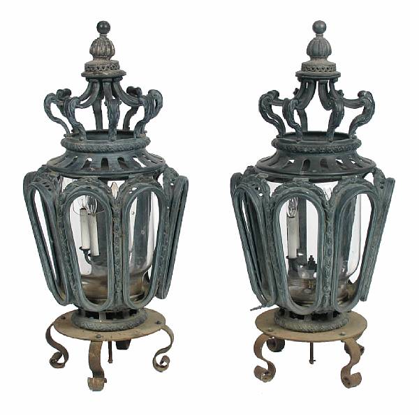 Appraisal: A pair of Neoclassical style cast iron lamps of octagonal