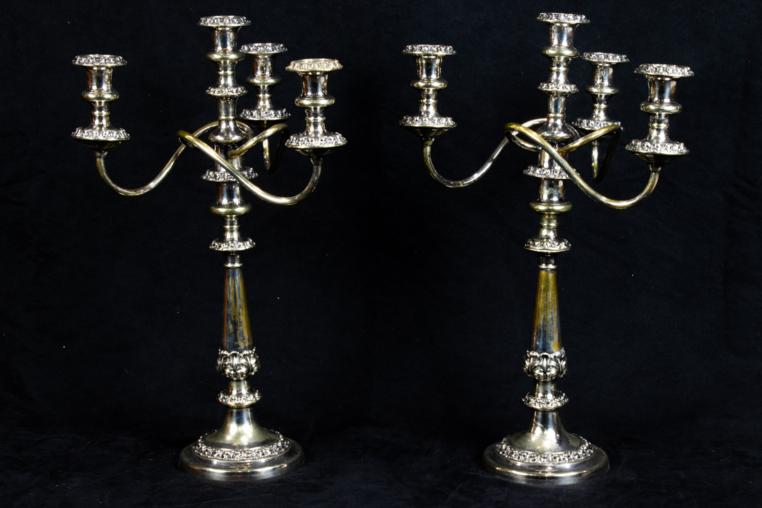 Appraisal: PAIR OF SILVER PLATED WEIGHT FOUR-LIGHT CANDELABRA Pair of silver