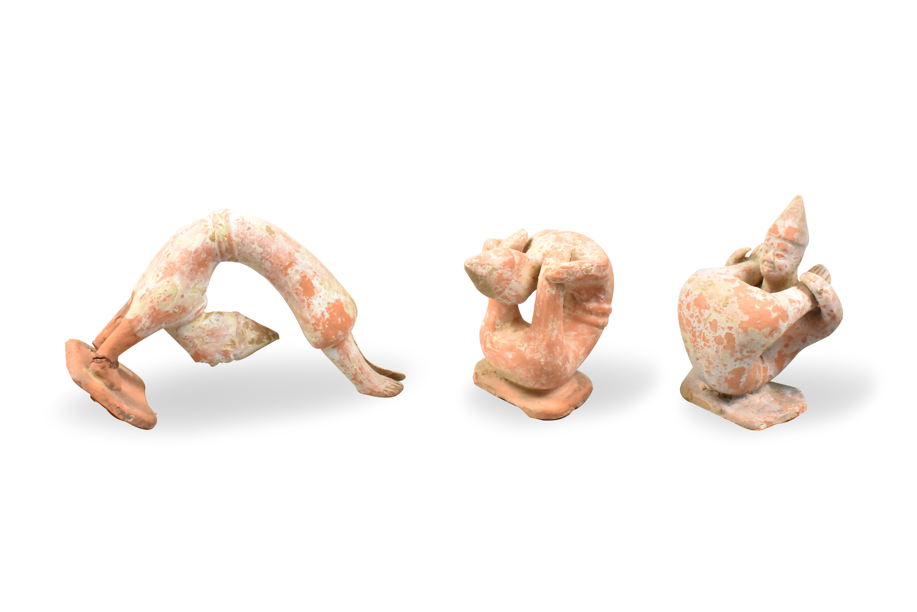 Appraisal: A trio of Chinese pottery entertainer figures dating from the