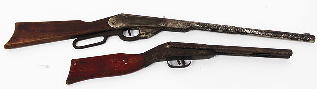 Appraisal: TWO OLD TIN AND WOOD HANDLED TOY GUNS one in