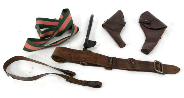 Appraisal: Two leather revolver holsters a leather Sam Browne belt and