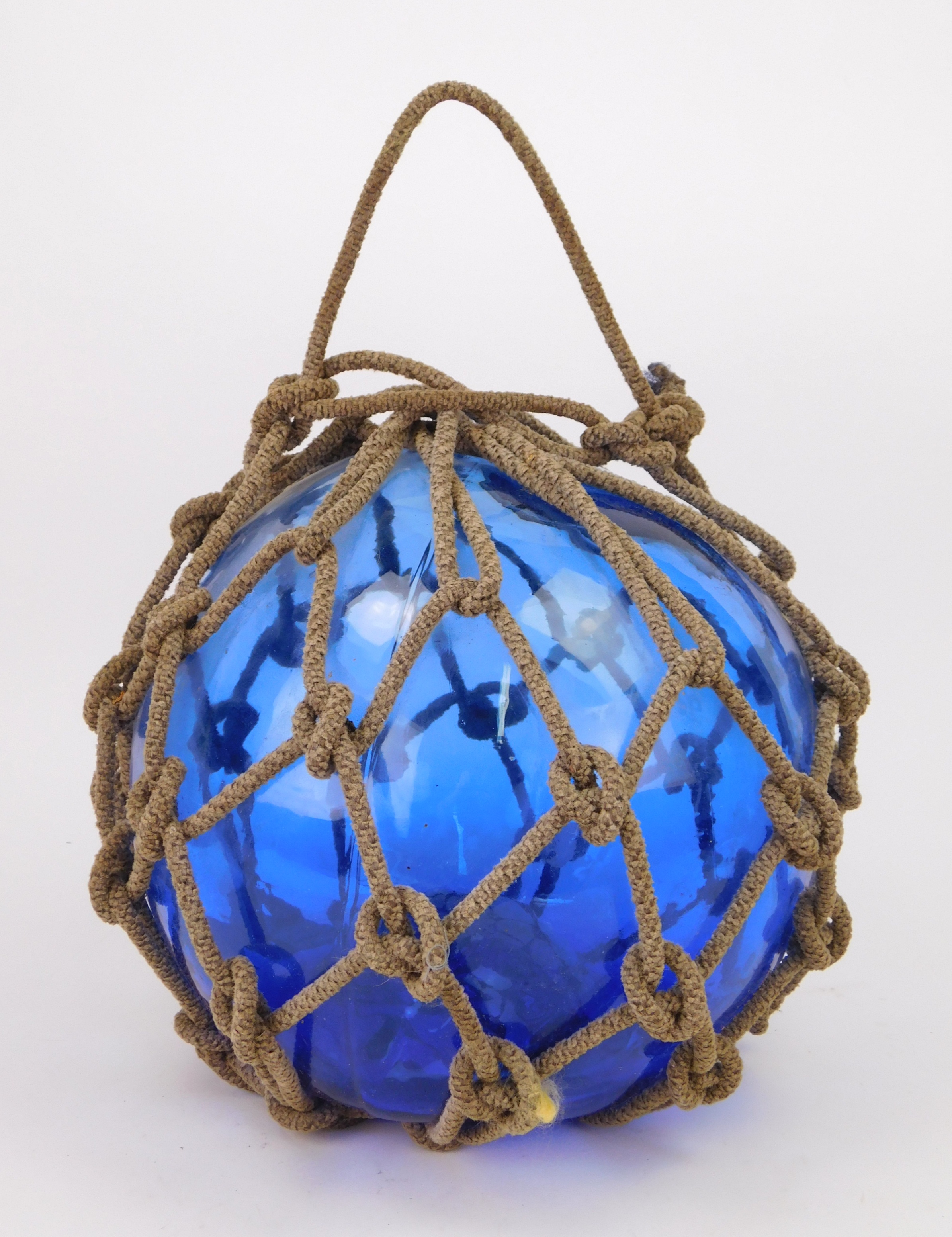 Appraisal: Vintage hand-blown blue glass bouy with rope net