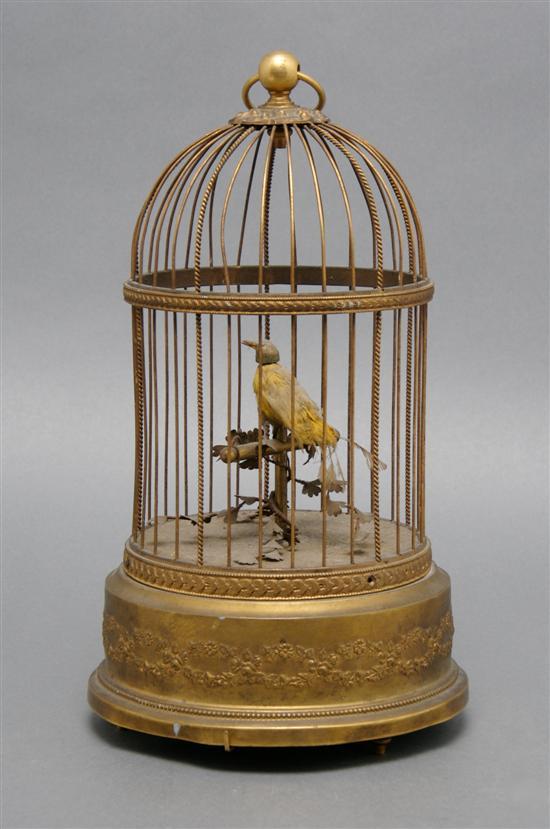 Appraisal: French Singing Bird in Cage of typical form with ring