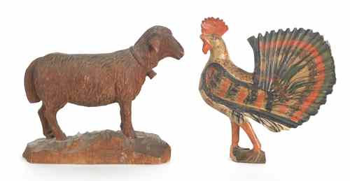 Appraisal: Two carved wooden German animals late th c to include