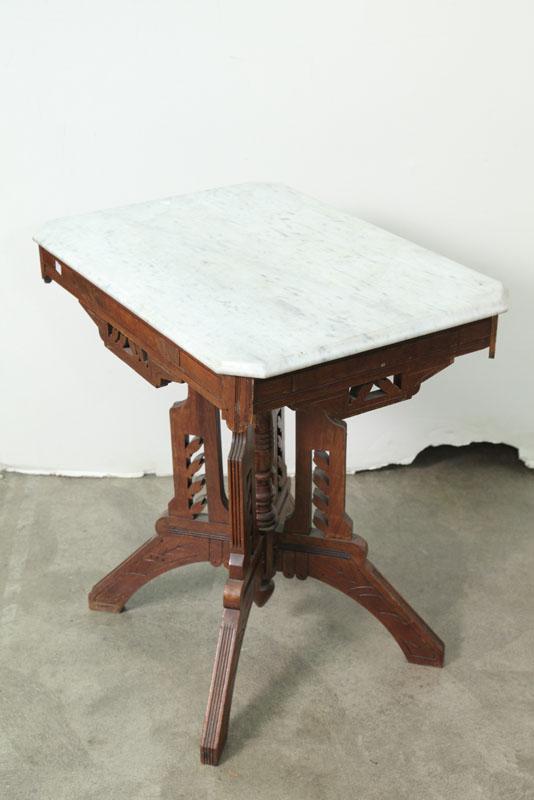 Appraisal: VICTORIAN MARBLE TOP STAND Walnut having a rectangular top with