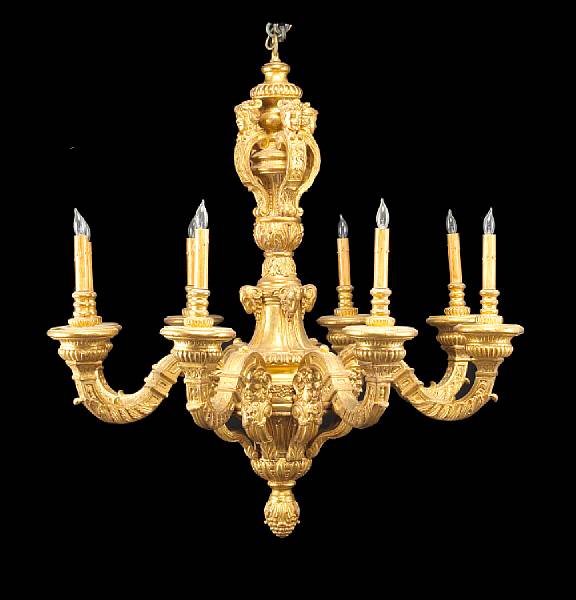 Appraisal: A pair of Baroque style giltwood eight light chandeliers Each