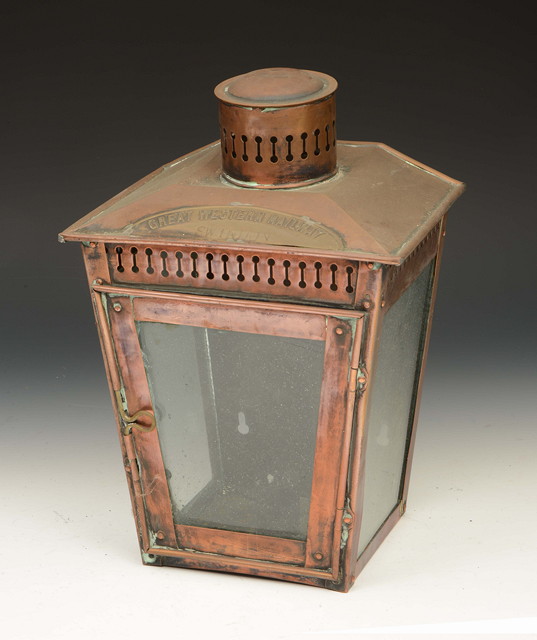 Appraisal: A COPPER STATION CANDLE LANTERN with cylindrical pierced vent glazed