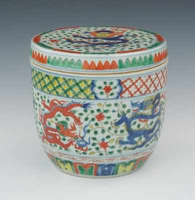 Appraisal: A Chinese Wucai Enameled Covered Bowl Glazed biscuit in three