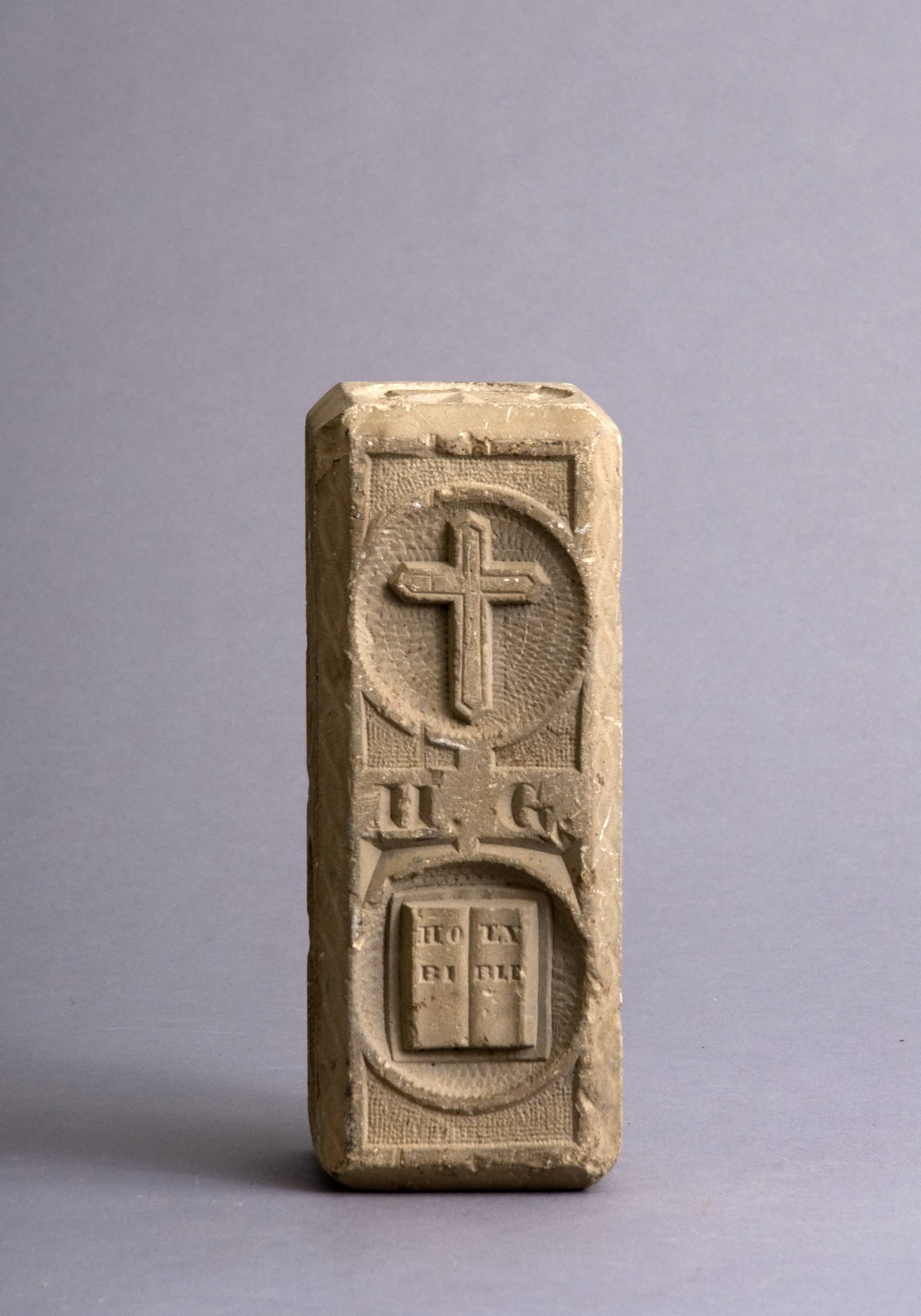 Appraisal: EARLY CARVED SANDSTONE BLOCK WITH RELIGIOUS SYMBOLS Including the Bible