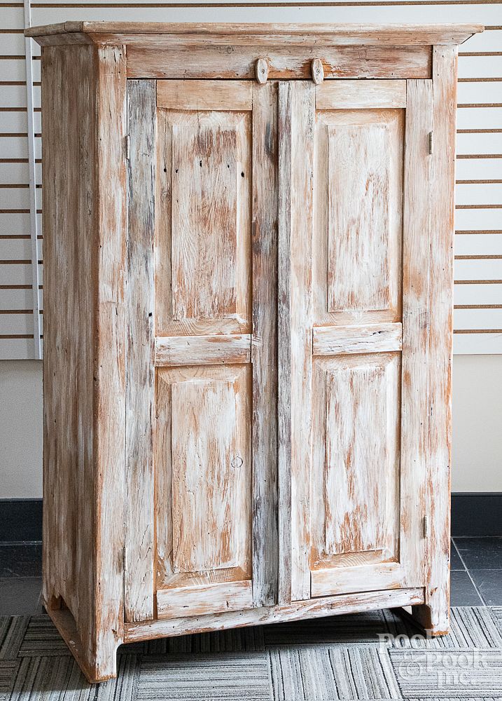 Appraisal: Painted barnwood cupboard Painted barnwood cupboard retaining a white wash