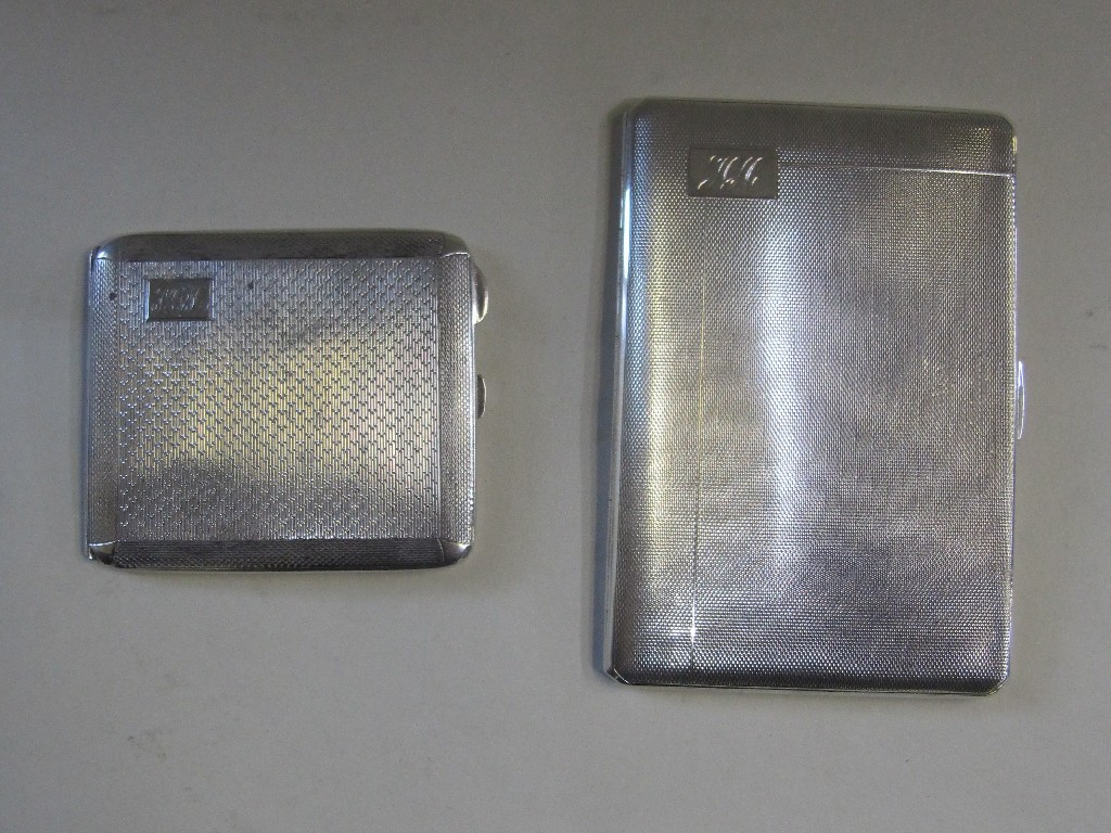 Appraisal: Lot comprising two silver cigarette cases