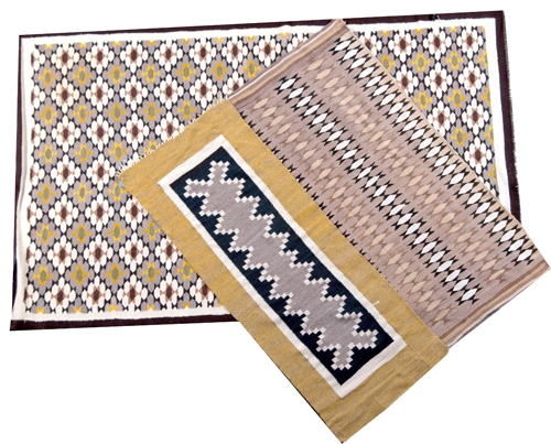 Appraisal: NAVAJO Three geometric rugs one runner and two area rugs