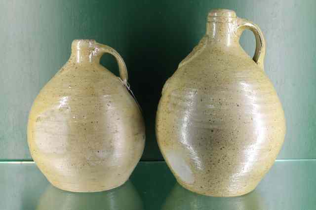 Appraisal: A GERMAN BELLARMINE STONE WARE FLASK and another slightly smaller