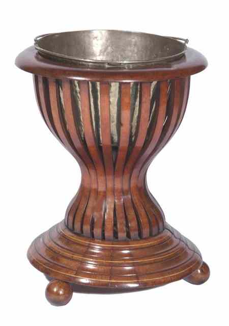 Appraisal: AN EDWARDIAN MAHOGANY BUCKET STAND of tapering form with stepped