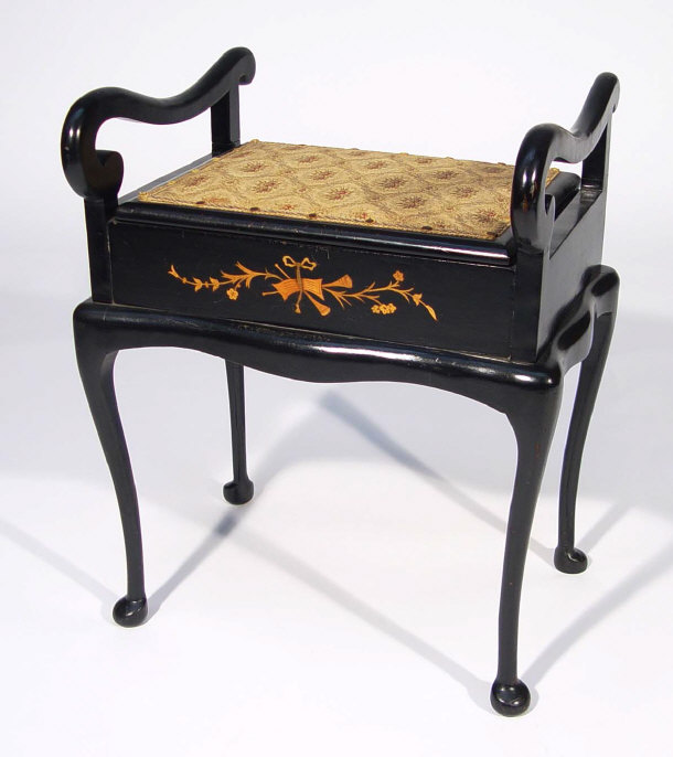 Appraisal: Victorian ebonised piano stool with scroll handles and painted musical