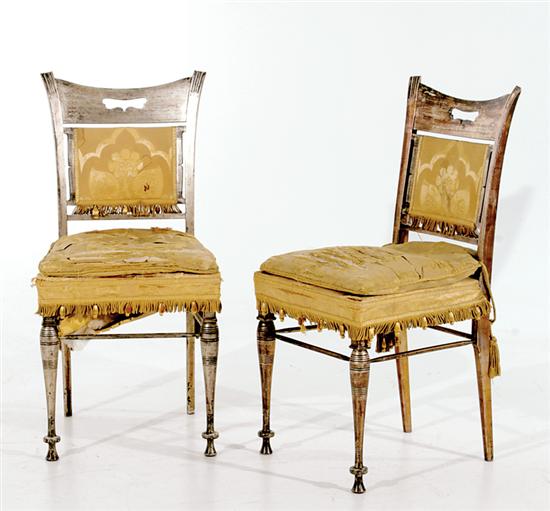 Appraisal: Pair Continental style silvergilt side chairs circa solid pierced crest