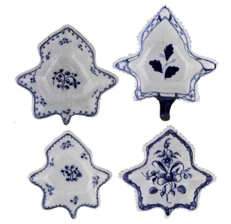 Appraisal: FOUR PEARLWARE PICKLE DISHES of vine leaf shape painted in