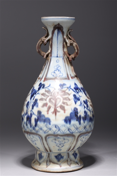 Appraisal: Chinese blue white and red porcelain vase with molded dragon