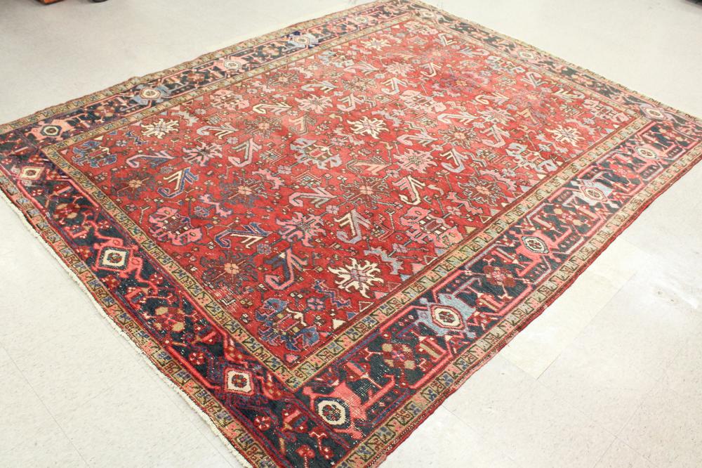 Appraisal: SEMI-ANTIQUE PERSIAN HERIZ CARPET East Azerbaijan Province northwestern Iran overall