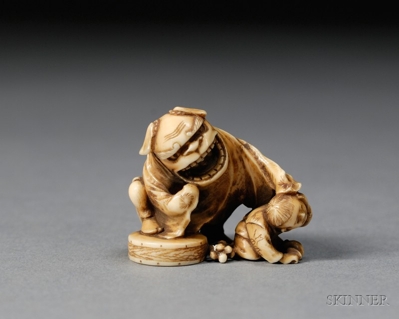 Appraisal: Ivory Netsuke Japan scene of a shishi dancer and a