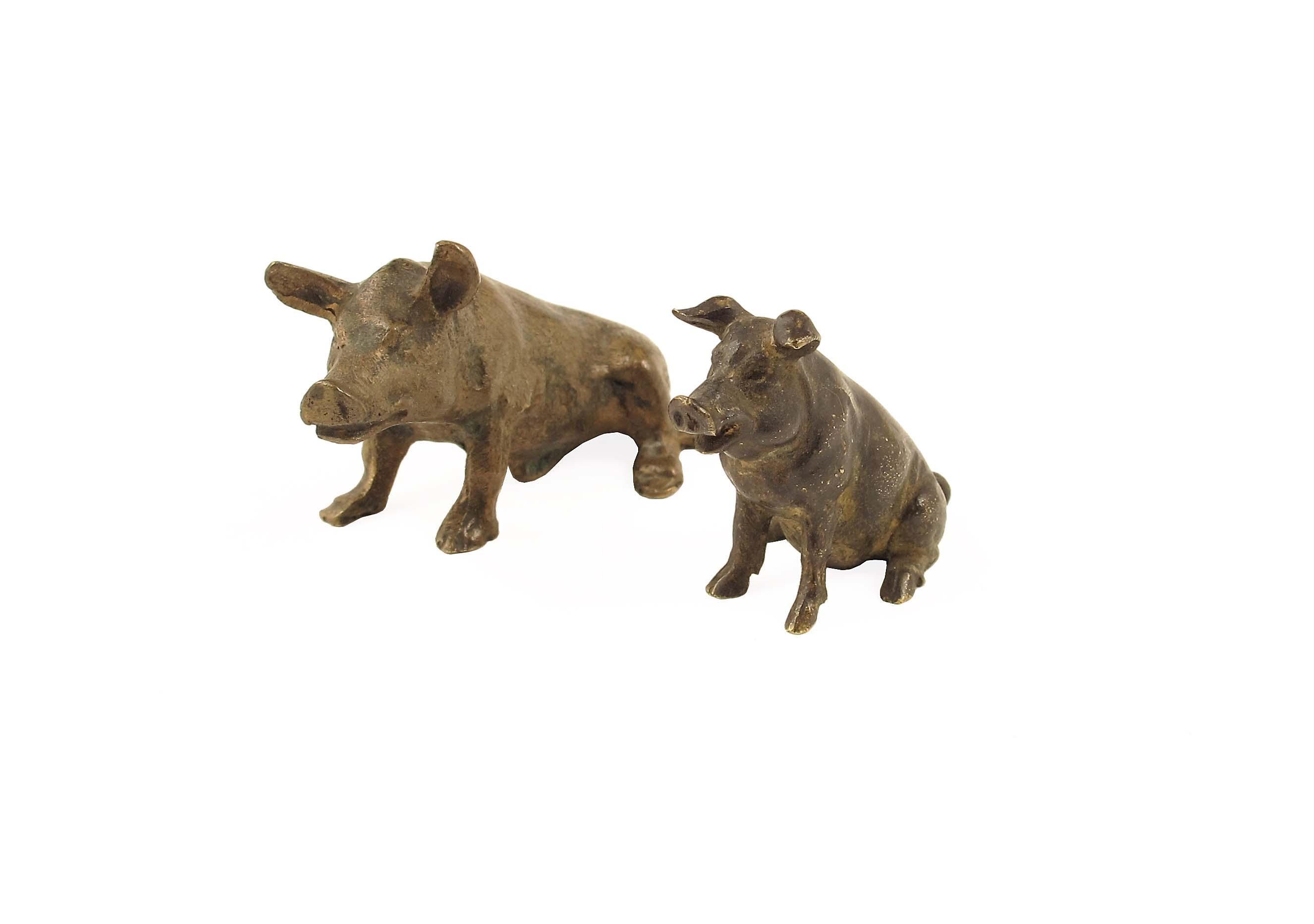 Appraisal: A bronze seated pig