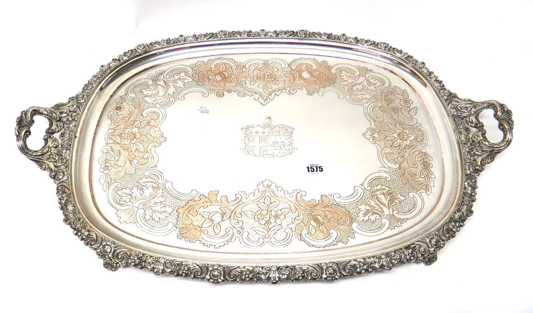 Appraisal: A Sheffield plated twin handled tray the centre engraved with