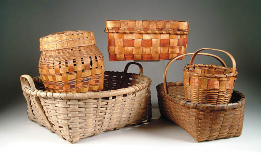 Appraisal: FIVE ANTIQUE BASKETS Two handle splint basket with open lattice