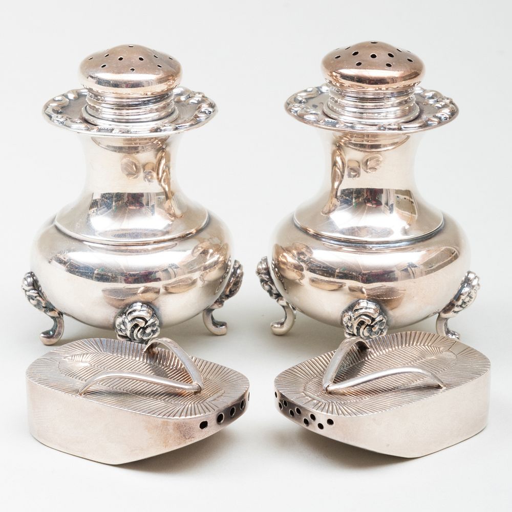 Appraisal: Pair of German Silver Casters and a Pair of Sandal