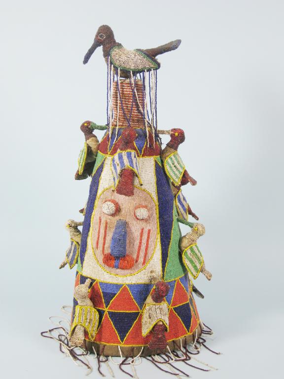 Appraisal: A Nigerian Yoruba beaded Oba's Crown decorated face and attached