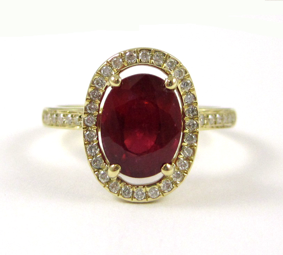 Appraisal: RUBY DIAMOND AND FOURTEEN KARAT GOLD RING with round-cut diamonds