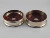 Appraisal: Two modern hallmarked silver wine coasters boxed and apparently unused