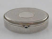 Appraisal: An Austrian silver oval pill box the lid with raying